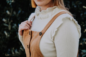 Cream Ruffled Turtle Neck